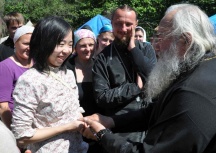 Крещение Сатоми Мидзогути в Японском море.  Межепархиальный молодежный слет «Андреевский городок».